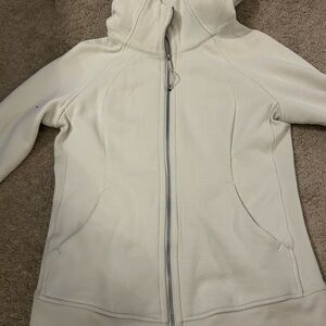 Lululemon full
Zip hoodie.  Size 8.  Bone color.